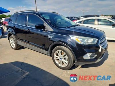 Czwarte zdjęcie samochodu z boku: 2017 FORD ESCAPE SE VIN:1FMCU0GD7HUA09644 - miniatura
