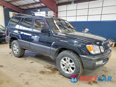 Czwarte zdjęcie samochodu z boku: 2002 LEXUS LX 470 VIN:JTJHT00W723516093 - miniatura