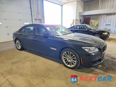 Czwarte zdjęcie samochodu z boku: 2015 BMW 750 LXI VIN:WBAYF8C53FD655193 - miniatura