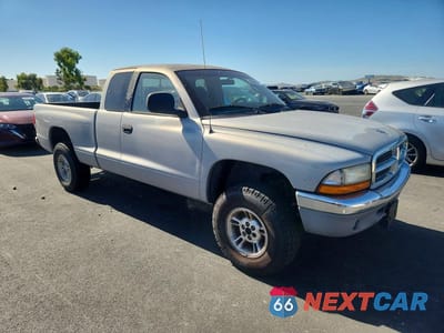 Czwarte zdjęcie samochodu z boku: 2000 DODGE DAKOTA VIN:1B7GG22X9YS611659 - miniatura