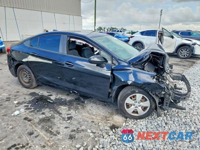 Czwarte zdjęcie samochodu z boku: 2017 CHEVROLET CRUZE LS VIN:1G1BC5SM6H7145794 - miniatura