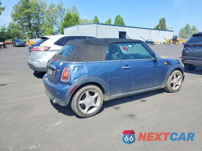 Trzecie zdjęcie samochodu z tyłu: 2010 MINI COOPER VIN:WMWMR3C56ATU97746 - miniatura