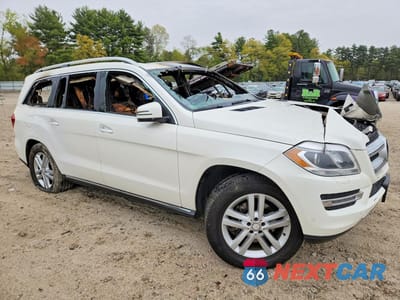 Czwarte zdjęcie samochodu z boku: 2014 MERCEDES-BENZ GL 450 4MATIC VIN:4JGDF7CE8EA323371 - miniatura