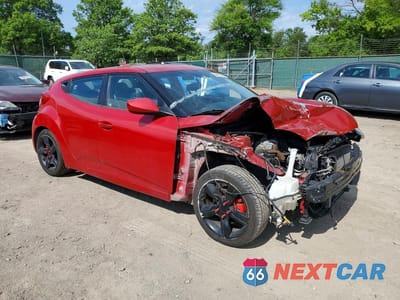 Czwarte zdjęcie samochodu z boku: 2014 HYUNDAI VELOSTER BASE VIN:KMHTC6AD3EU206031 - miniatura