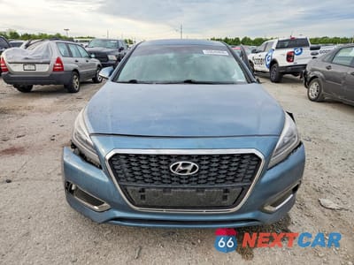 Piąte zdjęcie samochodu w środku: 2016 HYUNDAI SONATA HYBRID SE VIN:KMHE24L16GA035315 - miniatura