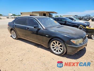 Czwarte zdjęcie samochodu z boku: 2003 BMW 745 LI VIN:WBAGN63423DR16397 - miniatura