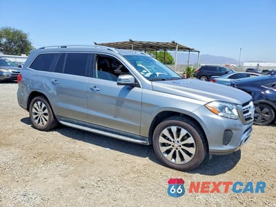 Czwarte zdjęcie samochodu z boku: 2017 MERCEDES-BENZ GLS 450 4MATIC VIN:4JGDF6EE7HA762878 - miniatura