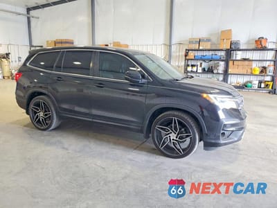 Czwarte zdjęcie samochodu z boku: 2021 HONDA PILOT EXL VIN:5FNYF5H54MB009628 - miniatura