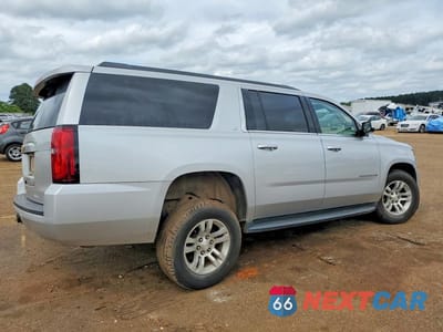 Trzecie zdjęcie samochodu z tyłu: 2018 CHEVROLET SUBURBAN C1500 LT VIN:1GNSCHKC0JR343336 - miniatura