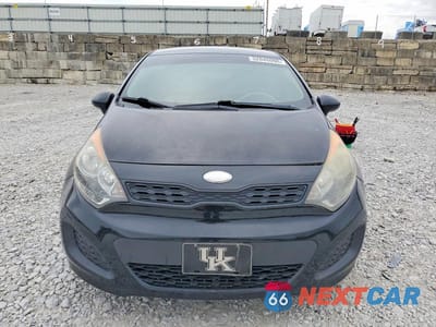Piąte zdjęcie samochodu w środku: 2013 KIA RIO LX VIN:KNADM5A37D6319200 - miniatura