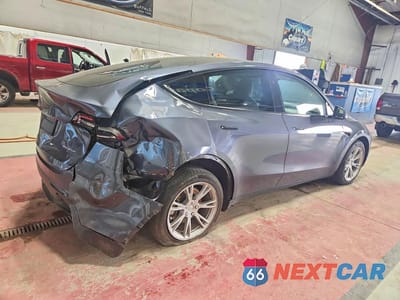 Trzecie zdjęcie samochodu z tyłu: 2023 TESLA MODEL Y VIN:7SAYGDEE9PF883248 - miniatura
