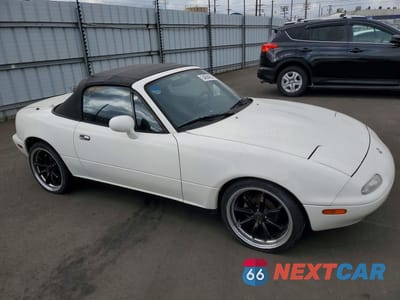 Czwarte zdjęcie samochodu z boku: 1993 MAZDA MX-5 MIATA VIN:JM1NA3517P0409998 - miniatura