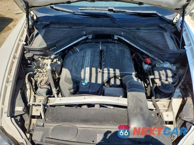 Zdjęcie 12 z 13 samochodu: 2013 BMW X5 XDRIVE35I VIN:5UXZV4C54D0B17627 - miniatura