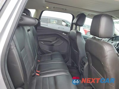 Zdjęcie 11 z 13 samochodu: 2014 FORD ESCAPE TITANIUM VIN:1FMCU0J91EUA77938 - miniatura