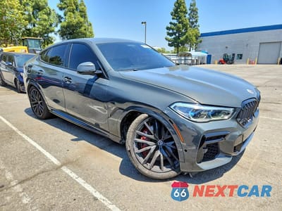 Czwarte zdjęcie samochodu z boku: 2023 BMW X6 M50I VIN:5UXCY8C02P9P46583 - miniatura