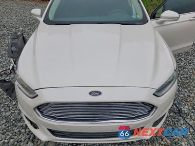 Zdjęcie 11 z 12 samochodu: 2013 FORD FUSION SE VIN:3FA6P0H73DR102024 - miniatura