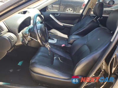 Zdjęcie 7 z 13 samochodu: 2006 INFINITI G35 BASE VIN:JNKCV51E56M500578 - miniatura