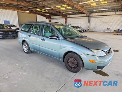 Czwarte zdjęcie samochodu z boku: 2005 FORD FOCUS ZXW VIN:1FAFP36N15W214564 - miniatura