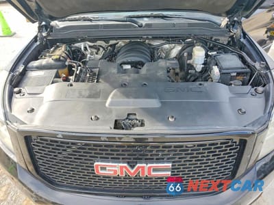Zdjęcie 12 z 13 samochodu: 2015 GMC YUKON DENALI VIN:1GKS2CKJ6FR660062 - miniatura