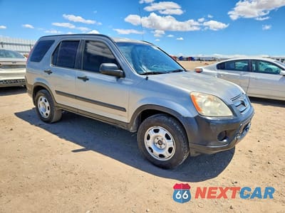 Czwarte zdjęcie samochodu z boku: 2005 HONDA CR-V LX VIN:JHLRD68555C013835 - miniatura