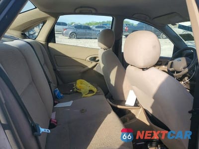Zdjęcie 10 z 13 samochodu: 2004 FORD FOCUS SE COMFORT VIN:1FAFP34364W174742 - miniatura