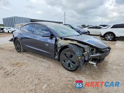 Czwarte zdjęcie samochodu z boku: 2021 TESLA MODEL 3 VIN:5YJ3E1EA1MF087839 - miniatura