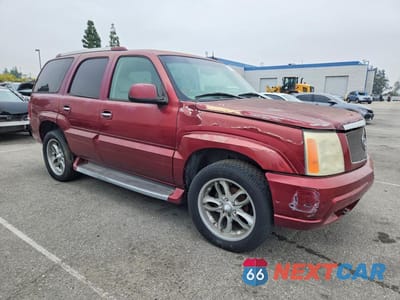 Czwarte zdjęcie samochodu z boku: 2002 CADILLAC ESCALADE LUXURY VIN:1GYEK63N92R289916 - miniatura