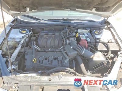 Zdjęcie 11 z 13 samochodu: 2011 FORD FUSION SE VIN:3FAHP0HG0BR344193 - miniatura