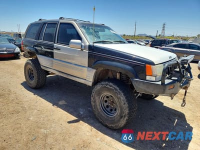 Czwarte zdjęcie samochodu z boku: 1998 JEEP GRAND CHEROKEE LAREDO VIN:1J4GZ58Y3WC365799 - miniatura