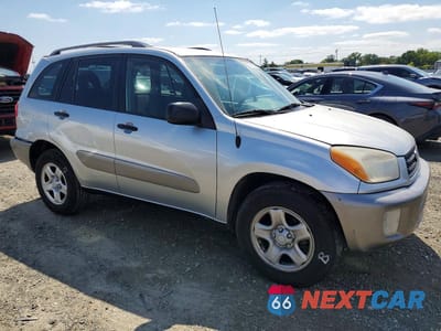 Czwarte zdjęcie samochodu z boku: 2002 TOYOTA RAV4 BASE VIN:JTEGH20VX20062065 - miniatura