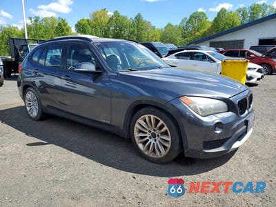 Czwarte zdjęcie samochodu z boku: 2014 BMW X1 XDRIVE28I VIN:WBAVL1C56EVY16566 - miniatura