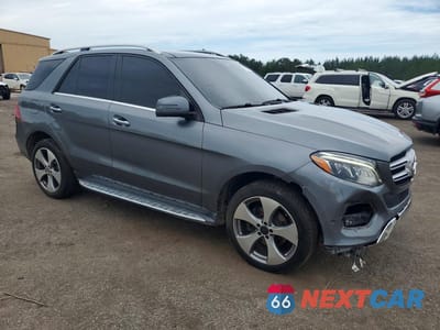 Czwarte zdjęcie samochodu z boku: 2017 MERCEDES-BENZ GLE 350 VIN:4JGDA5JB3HA945392 - miniatura