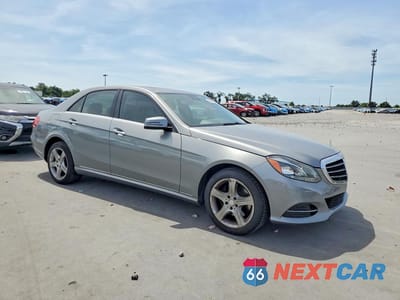 Czwarte zdjęcie samochodu z boku: 2014 MERCEDES-BENZ E 350 VIN:WDDHF5KB9EA963600 - miniatura