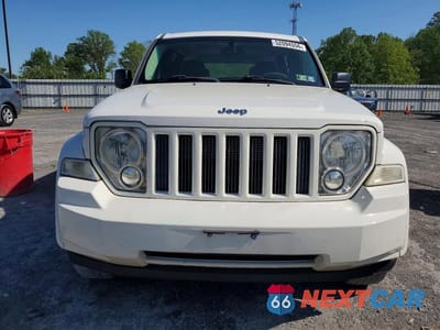 Piąte zdjęcie samochodu w środku: 2010 JEEP LIBERTY SPORT VIN:1J4PN2GK5AW133025 - miniatura