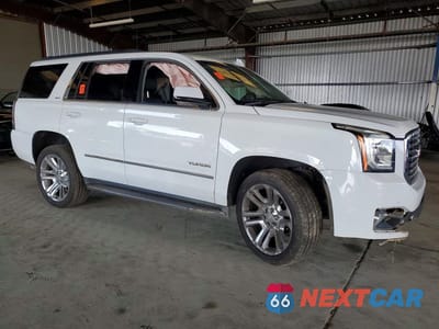 Czwarte zdjęcie samochodu z boku: 2019 GMC YUKON SLT VIN:1GKS2BKC8KR183768 - miniatura