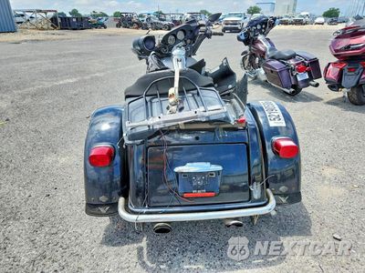 Czwarte zdjęcie samochodu z boku: 2010 HARLEY-DAVIDSON FLHTCUTG VIN:1HD1MAM11AB854095 - miniatura
