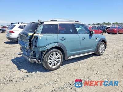 Trzecie zdjęcie samochodu z tyłu: 2023 MINI COOPER S E COUNTRYMAN ALL4 VIN:WMZ23BS03P3R44683 - miniatura