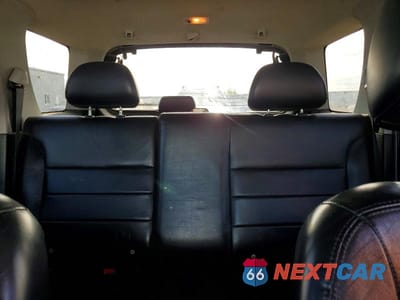 Zdjęcie 10 z 13 samochodu: 2003 FORD ESCAPE LIMITED VIN:1FMCU94173KC66810 - miniatura