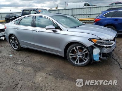 Czwarte zdjęcie samochodu z boku: 2020 FORD FUSION TITANIUM VIN:3FA6P0D95LR115167 - miniatura