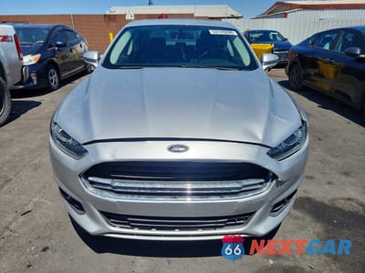 Piąte zdjęcie samochodu w środku: 2016 FORD FUSION SE PHEV VIN:3FA6P0PU6GR211704 - miniatura