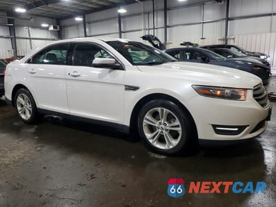 Czwarte zdjęcie samochodu z boku: 2016 FORD TAURUS SEL VIN:1FAHP2E81GG122009 - miniatura