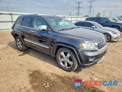 Czwarte zdjęcie samochodu z boku: 2011 JEEP GRAND CHEROKEE OVERLAND VIN:1J4RR6GT1BC607570 - miniatura
