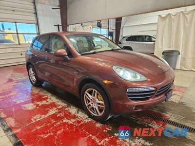 Czwarte zdjęcie samochodu z boku: 2012 PORSCHE CAYENNE S HYBRID VIN:WP1AE2A26CLA92265 - miniatura