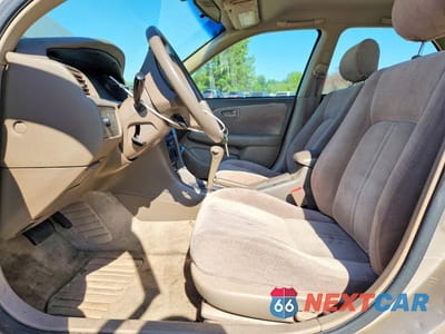Zdjęcie 7 z 12 samochodu: 1999 TOYOTA CAMRY LE VIN:JT2BG22K3X0360400 - miniatura
