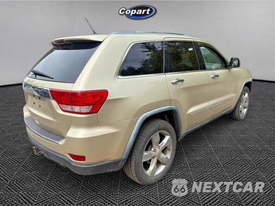 Czwarte zdjęcie samochodu z boku: 2011 JEEP GRAND CHEROKEE OVERLAND VIN:1J4RR6GT8BC605637 - miniatura