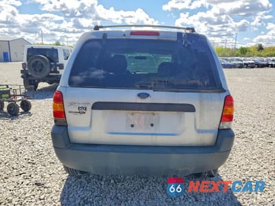 Zdjęcie 6 z 13 samochodu: 2003 FORD ESCAPE XLT VIN:1FMYU03143KE22028 - miniatura