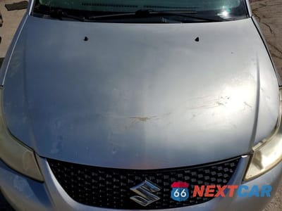 Zdjęcie 11 z 12 samochodu: 2013 SUZUKI SX4 LE VIN:JS2YC5A33D6100537 - miniatura