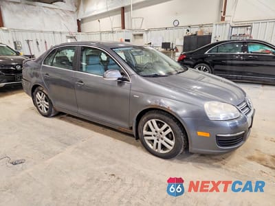 Czwarte zdjęcie samochodu z boku: 2007 VOLKSWAGEN JETTA WOLFSBURG VIN:3VWEF71K67M080874 - miniatura