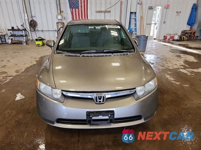 Piąte zdjęcie samochodu w środku: 2007 HONDA CIVIC LX VIN:1HGFA16527L031132 - miniatura