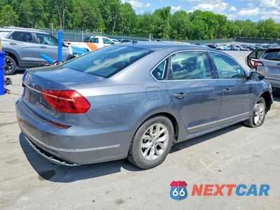 Trzecie zdjęcie samochodu z tyłu: 2016 VOLKSWAGEN PASSAT S VIN:1VWAT7A36GC059895 - miniatura